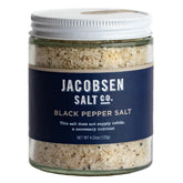 Jacobsen Salt Co. Black Pepper Salt bottle shows pepper-infused crystals for elevated steaks.