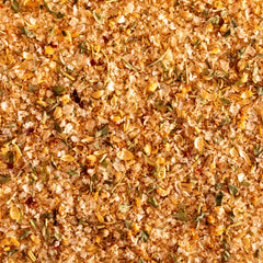 Jacobsen Salt Co. steak seasoning on a sizzling steak during grilling.