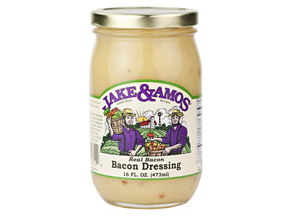Jake & Amos Real Bacon Dressing poured over greens for savory enhancement