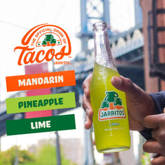 Jarritos Pineapple bottle close-up with tropical aroma for sunny occasions.
