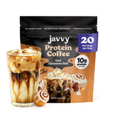 Javvy Iced Cinnamon Roll Protein Coffee bottle pour showing convenient protein boost