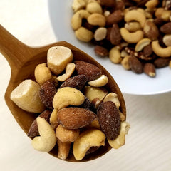 Reusable 32 oz jar stores Jaybee's Deluxe nuts to keep them fresh between uses.