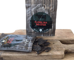 Jerky.com Carolina Reaper packaging label, premium on-the-go snack with no preservatives.
