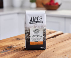 Jims Organic Coffee Double Chocolate aroma steam rising from a hot cup.