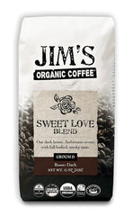 Jim's Organic Coffee Sweet Love Blend ground 11oz bag showcases bold dark roast aroma for home brewing.