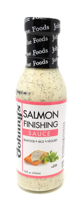 Johnny's Salmon Finishing Sauce bottle pour enhances salmon with creamy dill flavor.