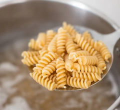 Served Jovial Einkorn pasta dish with vibrant colors and nutty notes.