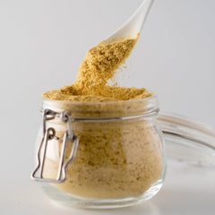 Jovvily Nutritional Yeast Flakes sprinkled on popcorn for savory, cheesy movie-night flavor.