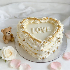 Joyvitas gold pearls decorating cookies for a refined festive touch