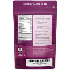 Judee's Cream of Tartar powder closeup reveals fine texture for whipped cream stability.
