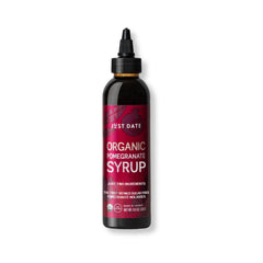 Just Date Syrup pomegranate bottle for versatile sweetening in desserts and beverages.