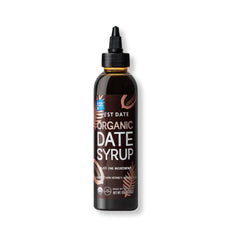 Just Date Syrup bottle pour shows caramel sweetness for coffee