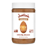 Justin's Almond Butter Cinnamon jar close-up shows creamy texture and warm aroma.