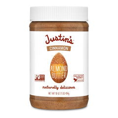 Justin's Almond Butter Cinnamon jar close-up shows creamy texture and warm aroma.
