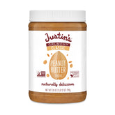 Justins Butter Peanut Crunchy jar on kitchen counter, ready to snack with crunch.