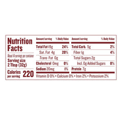 Justins Peanut Butter Classic Crnch being spread on toast for a quick snack.