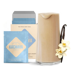 Ka’Chava Vanilla shake glass close-up highlighting creamy, plant-based nutrition.