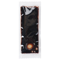 Kari-Out Co soy sauce packets closeup highlights fermented aroma and smooth texture.