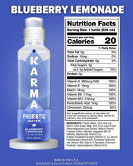 Karma Probiotic Water Blueberry Lemonade label closeup highlights BC30 probiotics and vitamin blend.