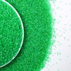 Kasvan Green Sanding Sugar topping on ice cream – colorful, crunchy garnish.