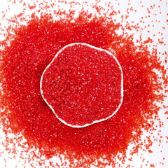 Kasvan Red Sanding Sugar used to decorate cupcakes with festive red sparkle.