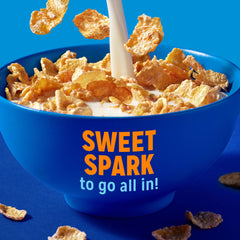 Kellogg's Frosted Flakes cup featuring Tony the Tiger, spoon-ready.