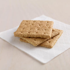 Kellogg's Honey Grahams crackers arranged on a serving tray for sharing.