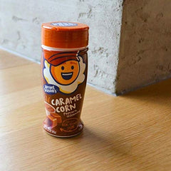 Kernel Season's caramel popcorn seasoning jar dispenses evenly for easy coating.