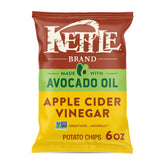 Kettle Brand avocado oil apple cider vinegar chips in bag, tangy bite, gluten-free snack.