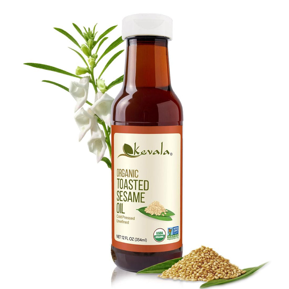 Kevala Toasted Sesame Oil bottle being poured to add nutty flavor.
