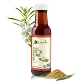 Kevala Toasted Sesame Oil bottle being poured to add nutty flavor.