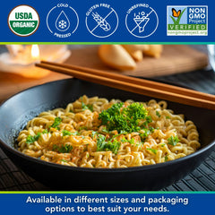 Kevala toasted sesame oil bottle with wok, perfect for mid-heat cooking.