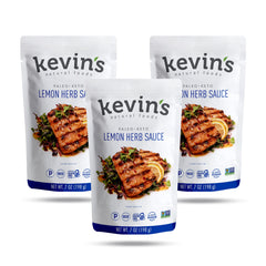 Kevin's Natural Foods Lemon Herb Sauce glass bottle on kitchen counter, quick meal inspiration