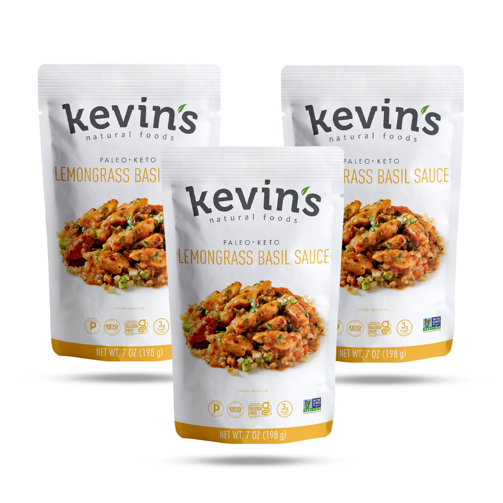 Kevin's Natural Foods Lemongrass Basil Sauce bottle pour for quick, flavorful stir-fries.