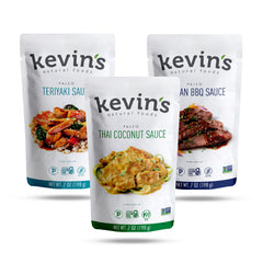 Kevin's Natural Foods teriyaki simmer sauce bottle with glossy glaze for versatile stir-fry