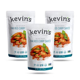 Kevin's Thai Red Curry Sauce bottle front showing vibrant ready-to-use flavor.