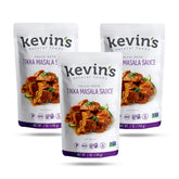 Kevin's Natural Foods Tikka Masala sauce bottle pouring for a quick weeknight dinner