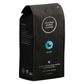 Kicking Horse Decaf Swiss Water pack shot showing organic, fair trade coffee for a smooth caffeine-free experience
