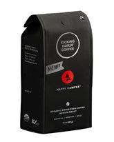 Kicking Horse Happy Camper whole bean bag showing premium organic coffee for camping and home brewing