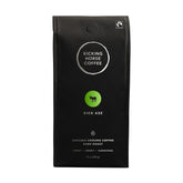 Kicking Horse Kick Ass dark roast packaging highlighting organic and fairtrade quality.