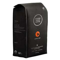 Kicking Horse Smart Ass coffee beans close-up highlighting rich aroma.