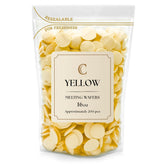 KIDU Merckens melting wafers in yellow bulk bag for smooth dipping and glossy coatings.