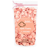 KIDU Pantry pink melting chocolate wafers in a 1 lb bulk bag ready for baking.