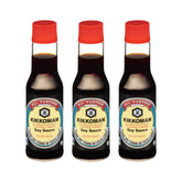 Kikkoman bottle pour demonstrates smooth flavor boost for meals.