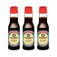 Kikkoman bottle pour demonstrates smooth flavor boost for meals.