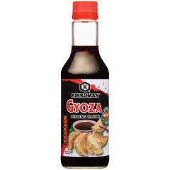 Kikkoman Gyoza Dipping Sauce being poured for a tangy-sweet finish on dishes