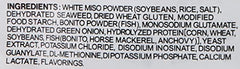 Close-up of white miso paste in the mix highlighting subtle umami.