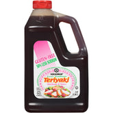 Kikkoman Less Sodium Gluten-Free Teriyaki bottle pour enhances marinades with bold, reduced-sodium flavor.
