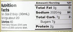 Close-up of Kikkoman Memmi Sauce label highlighting key ingredients for depth.