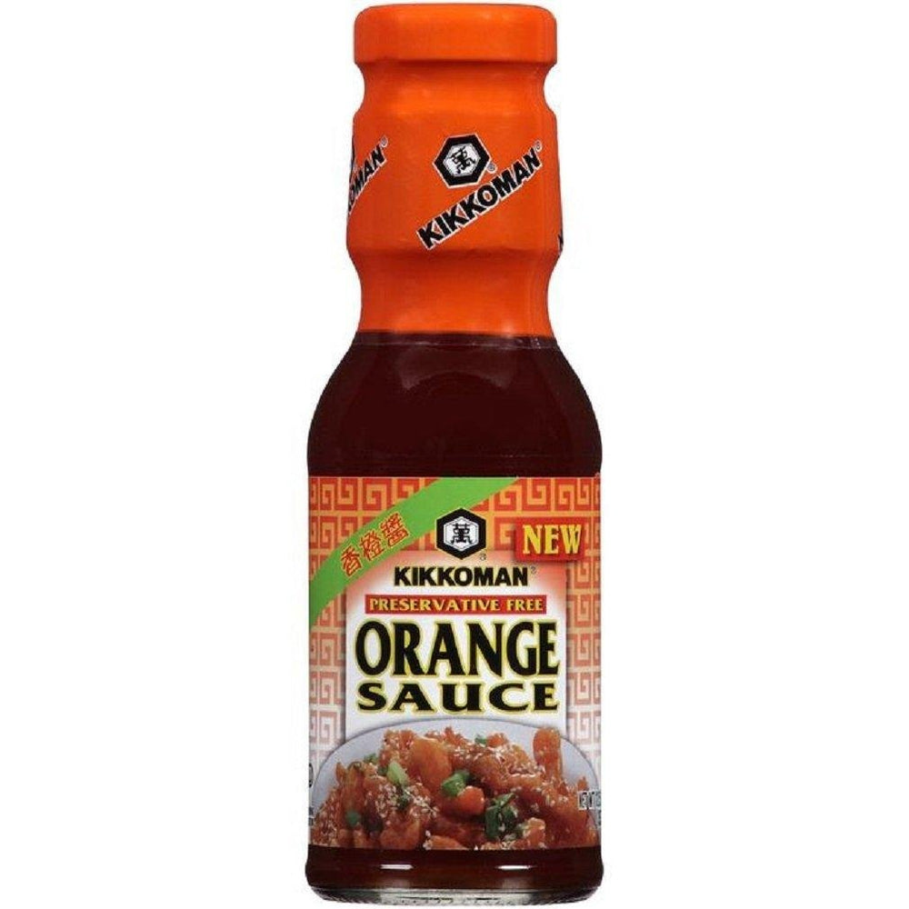 Kikkoman orange sauce bottle pour for a tangy glaze and recipe versatility.